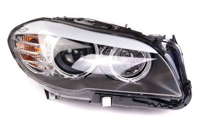 BMW Headlight Assembly - Passenger Side (Halogen) 63117203244 - Hella 010131061
